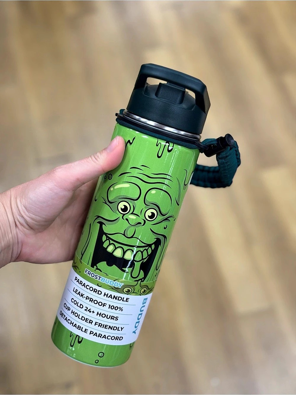 Frost Buddy Glow! Grumpy Green Water Bottle with Paracord Handle